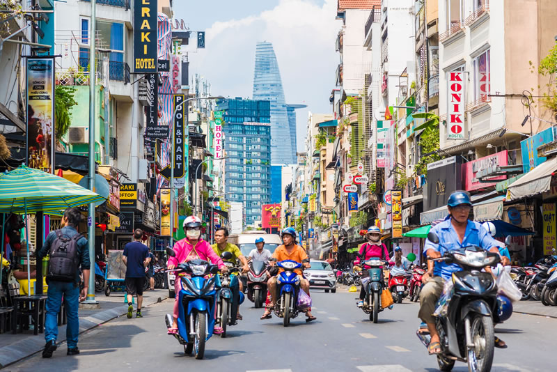 Bui Vien Street perspective with Bitexco Tower stock photo