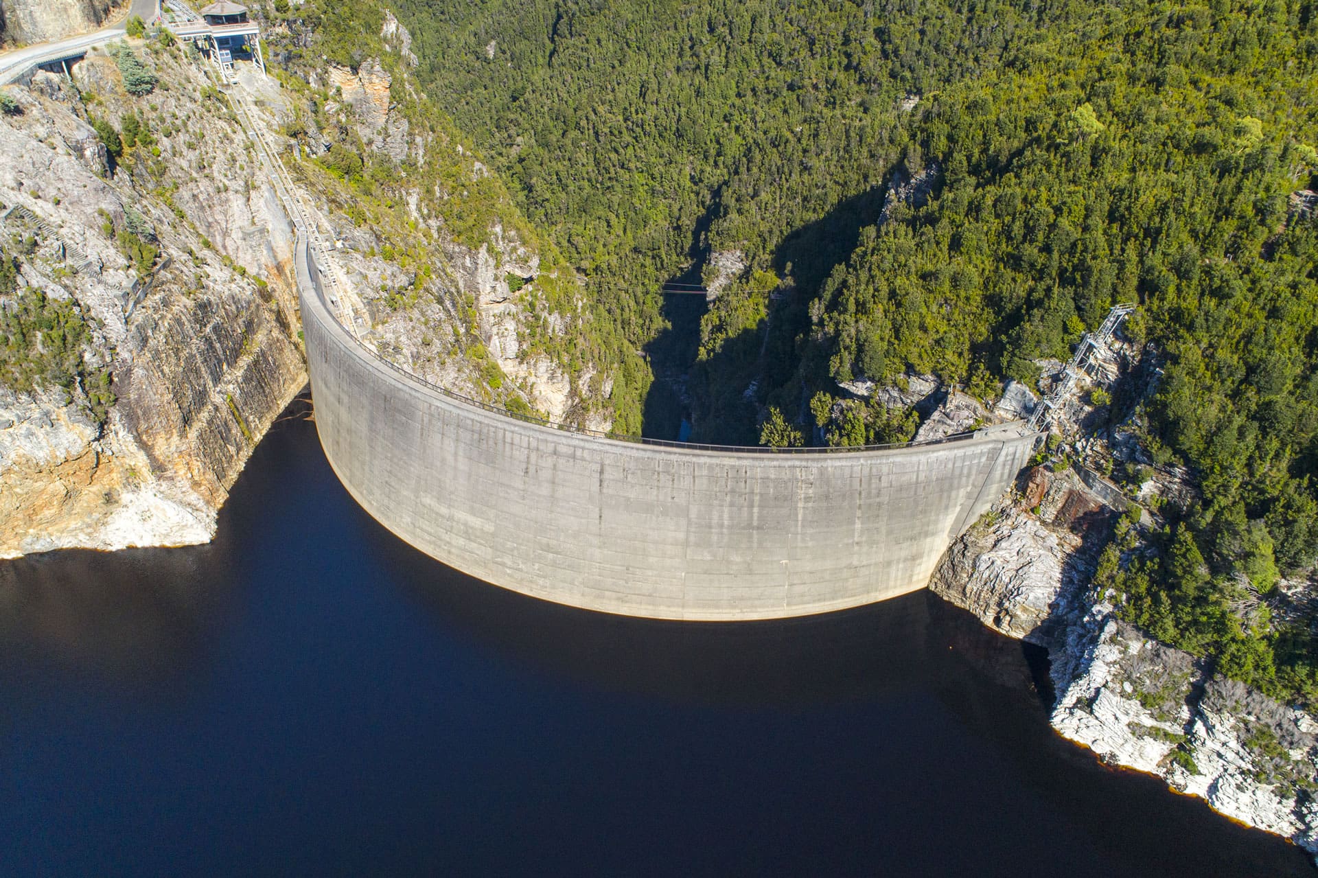 Dam wall in gorge from air