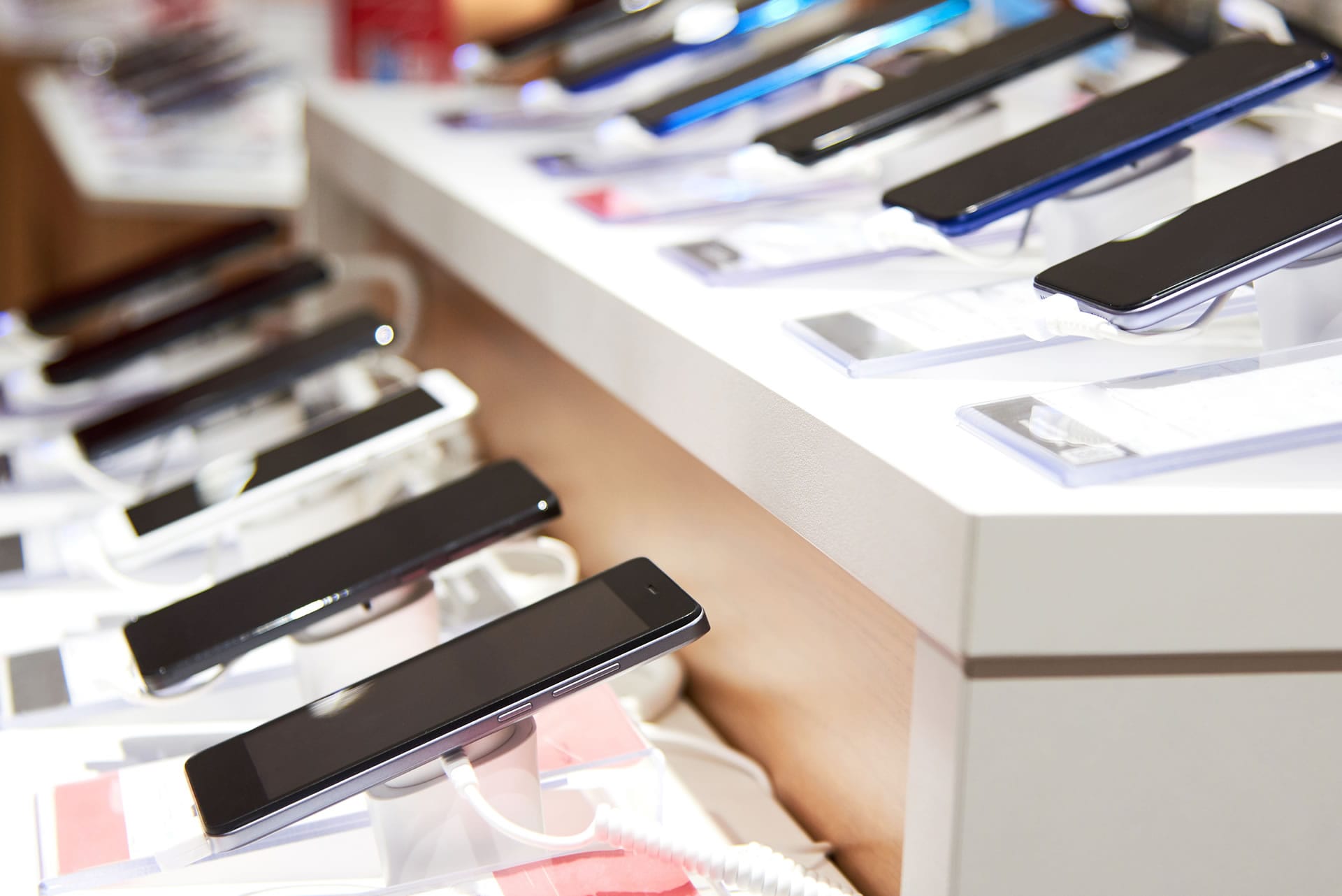 Smartphones on display in store