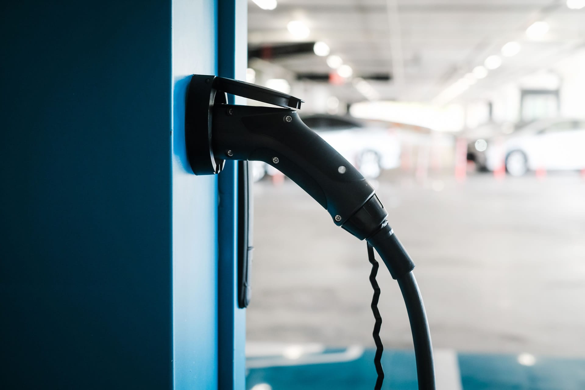 EV charging cable in car park