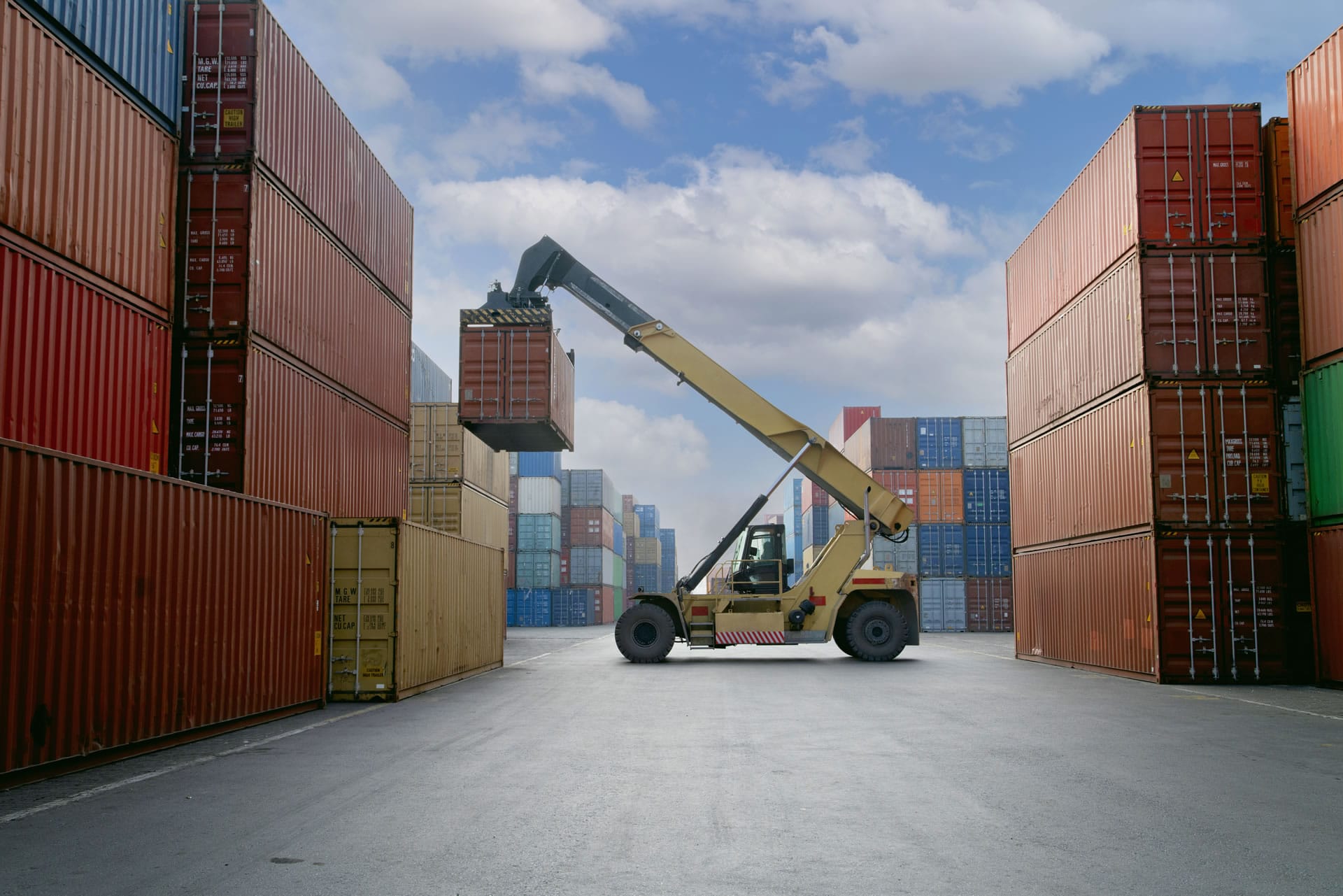 Container stacker in yard