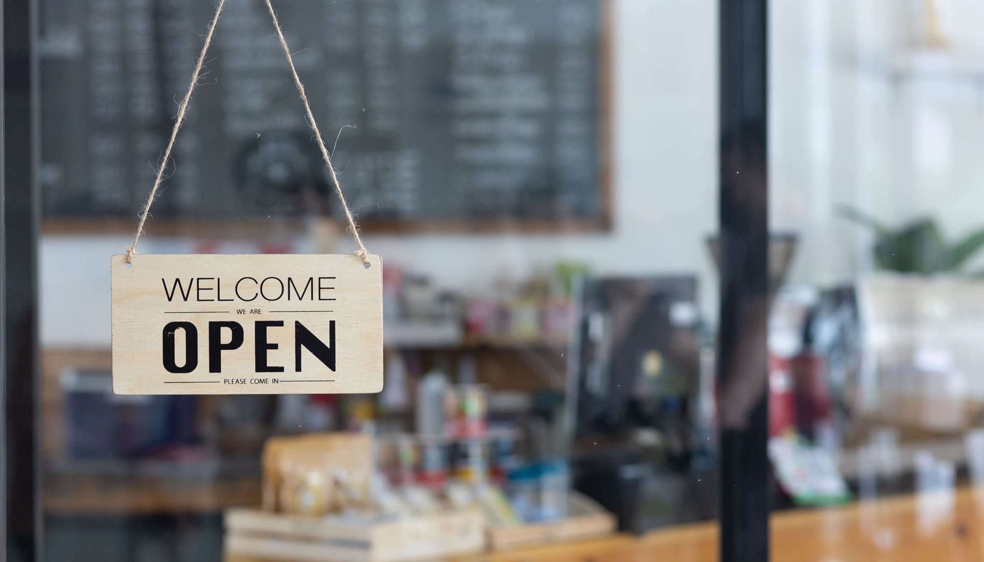 Shop sign "Welcome Open"
