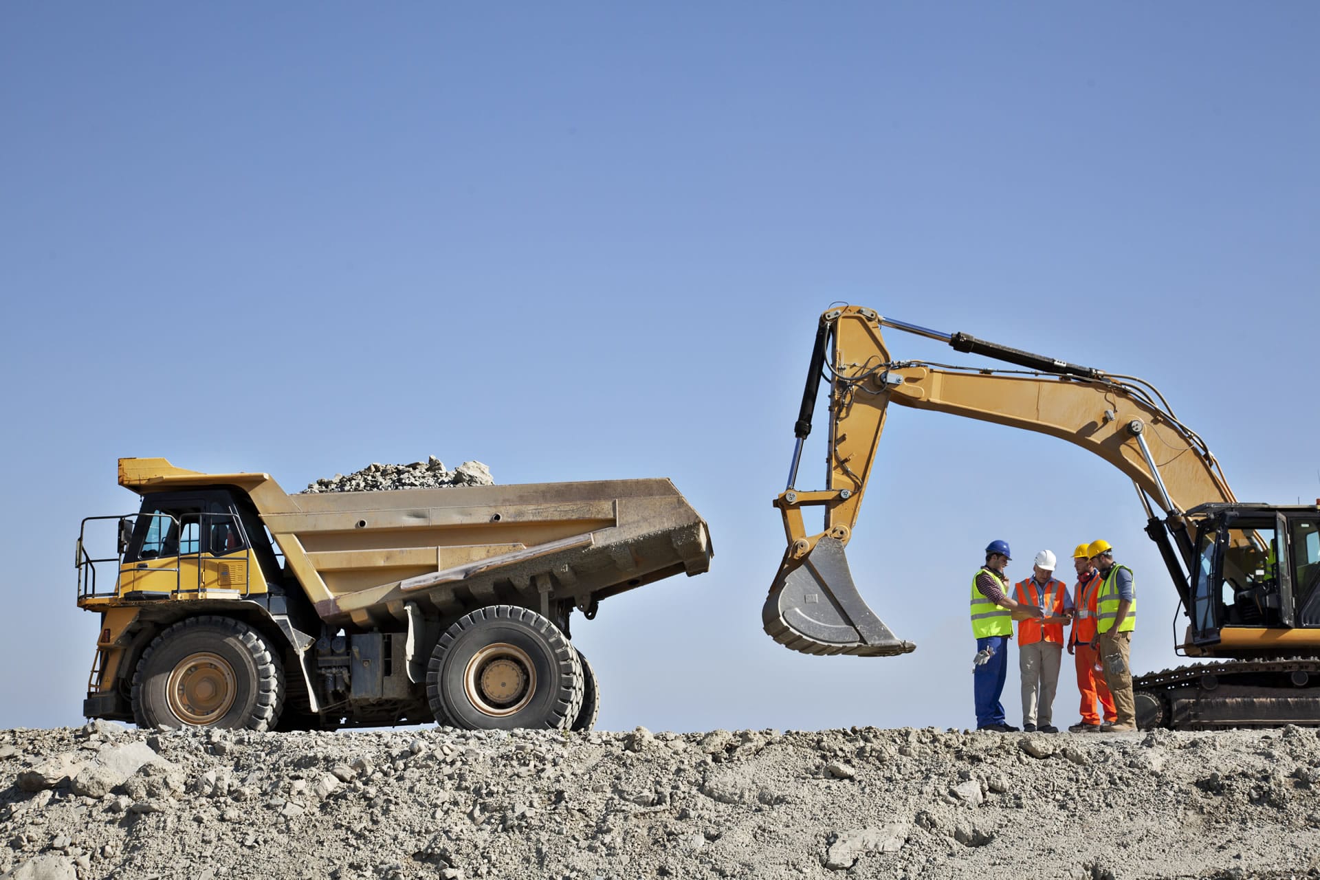 Haul truck and excavator at mine