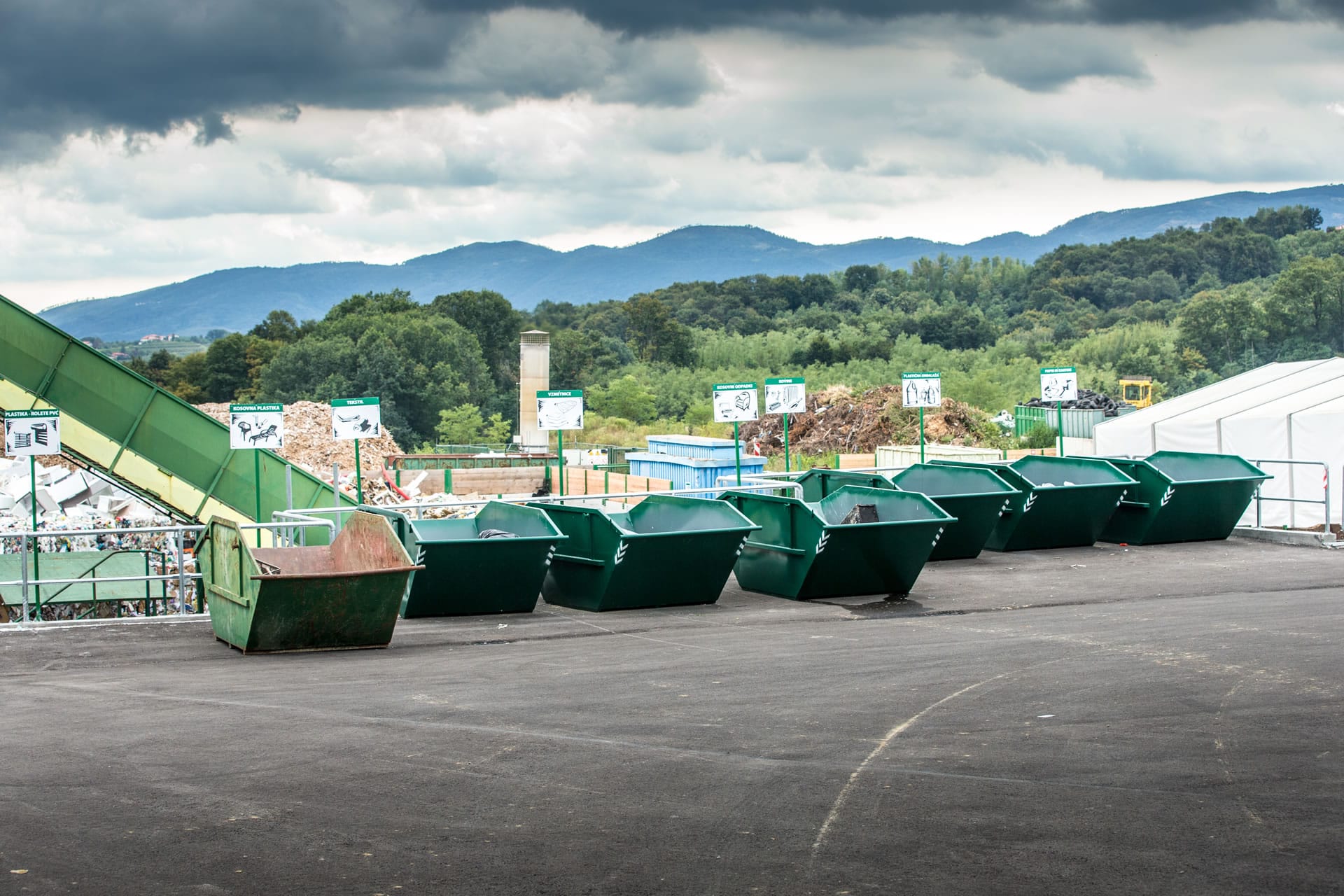 Green skip bins at transfer station